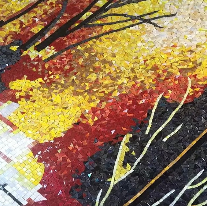Mosaic artwork with autumn leaves in red, yellow, and black.