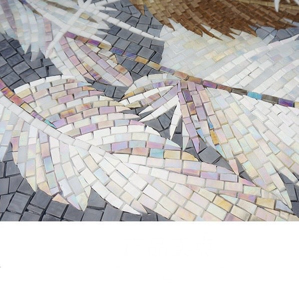 Mosaic artwork with multicolored tiles on a white background