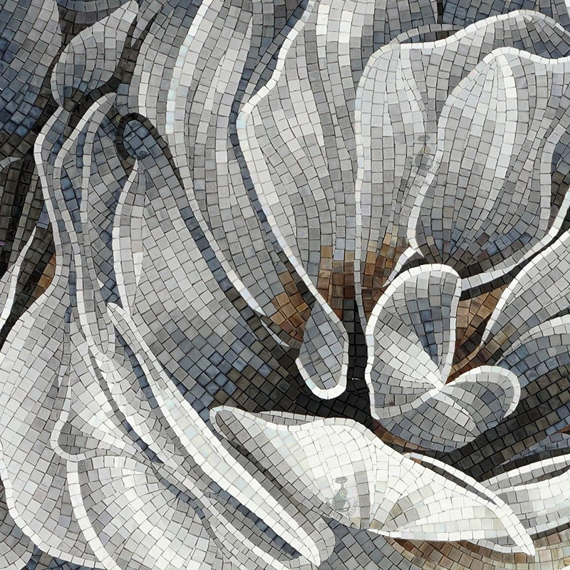 Mosaic artwork of a white flower with gray and brown tones