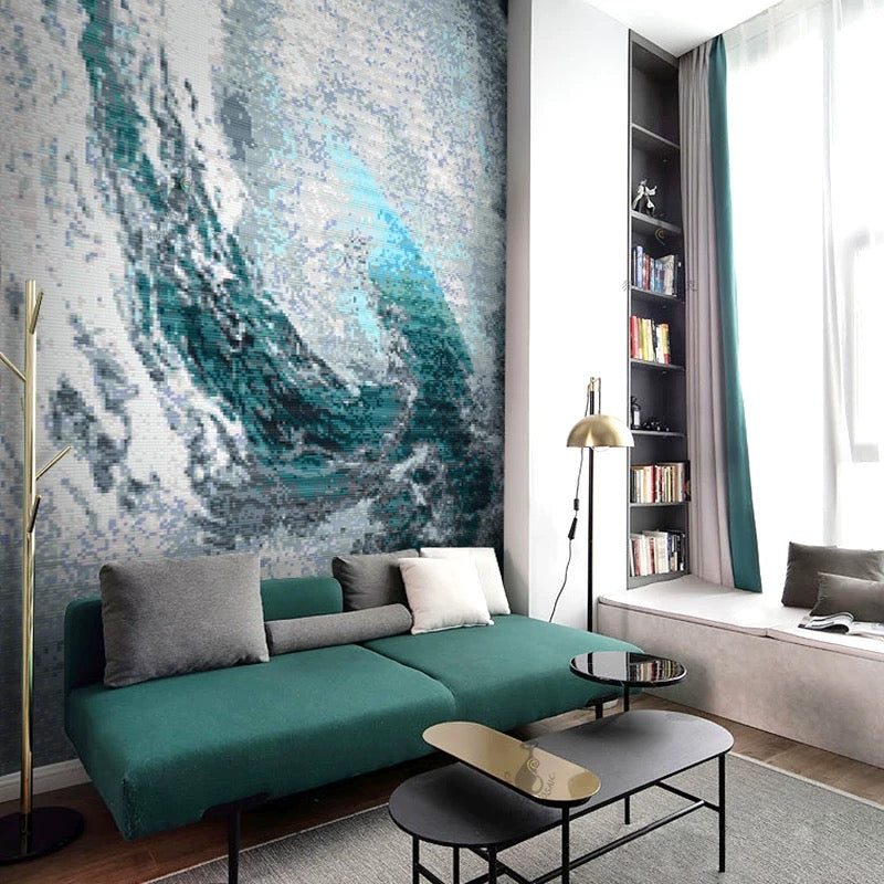 Modern living room with teal sofa, abstract wall art, and bookshelf.