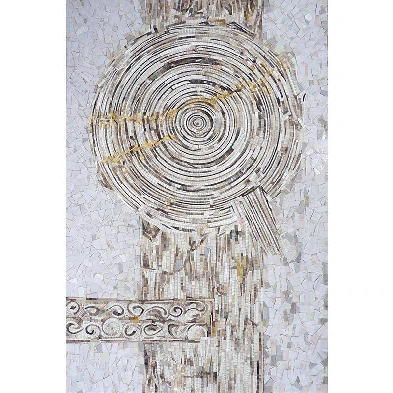 Decorative mosaic wall art with concentric circular design on a white background