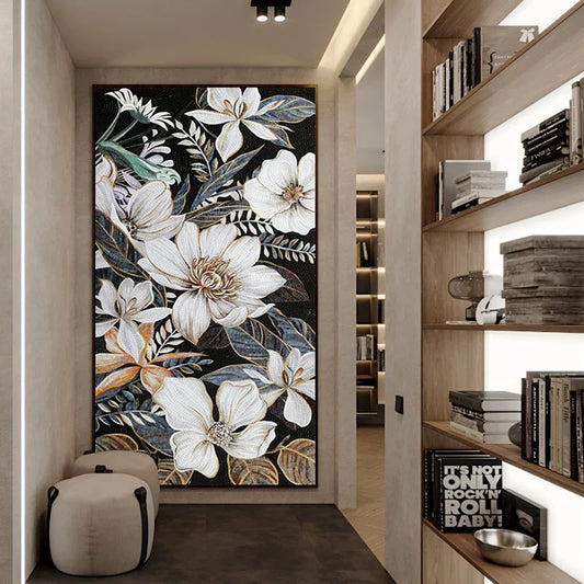 Decorative floral mosaic wall mural art in a modern interior setting with bookshelves.