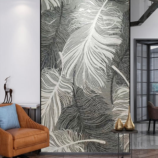 Decorative mosaic wall mural with feather pattern in a modern living room setting.