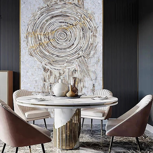 Modern dining room with marble table and abstract mosaic wall art